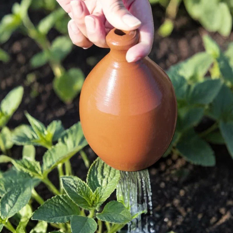 Thumb Watering Can